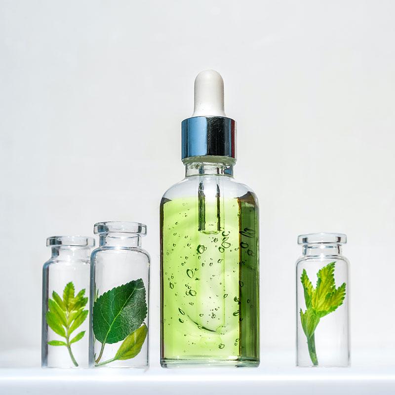 Our Story image featuring squalane in a private label skincare boston round dropper bottle